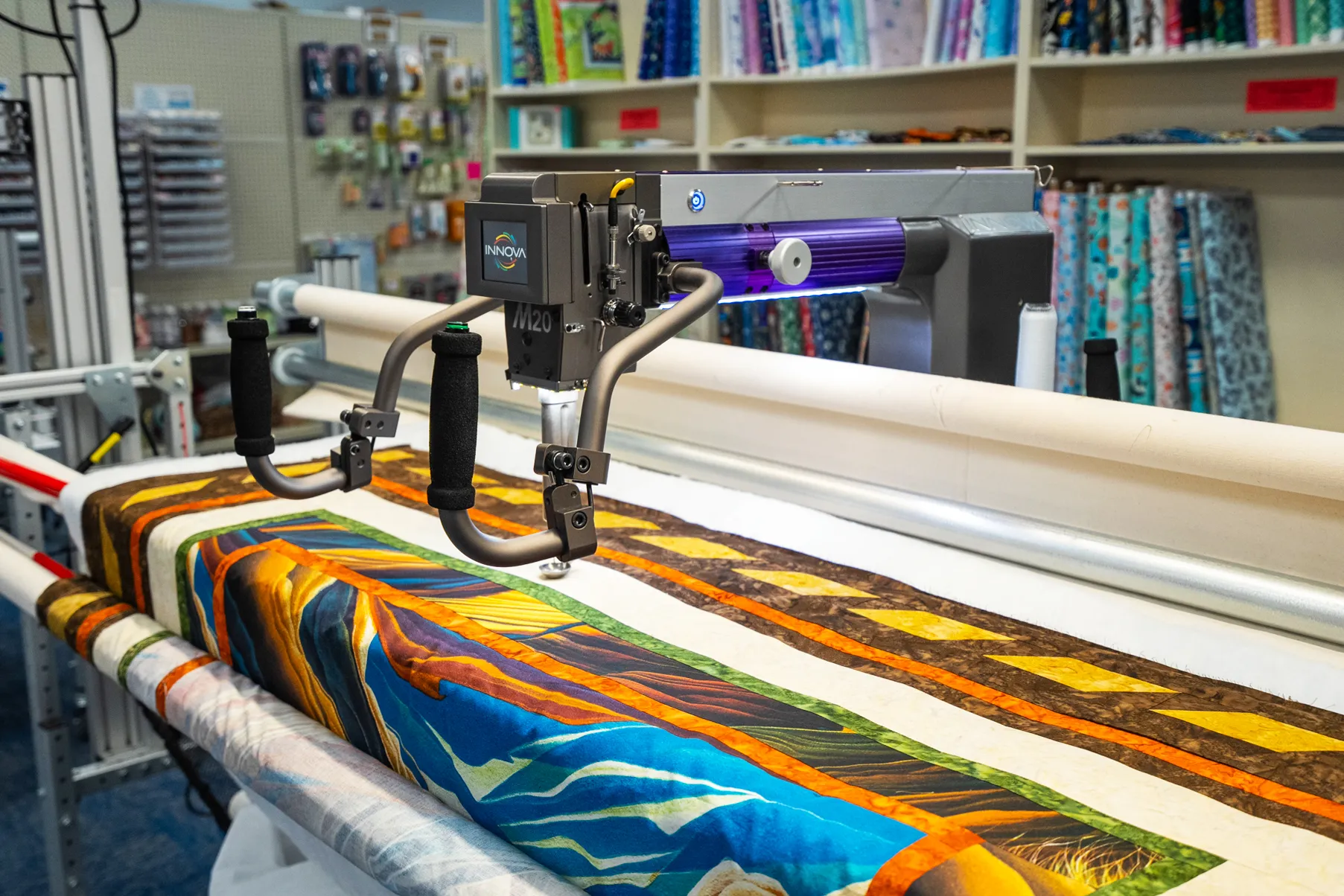 Innova longarm quilting machine in the Fab Fabrics showroom